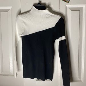 Half shirt and black sweater